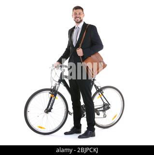 Schöner Geschäftsmann mit Fahrrad auf weißem Hintergrund Stockfoto