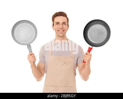 Junger Mann mit Bratpfannen, isoliert auf weiß Stockfoto