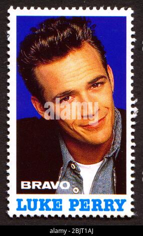 Luke Perry auf einer Vintage Briefmarke von Bravo von Anfang der 1980er Jahre Stockfoto