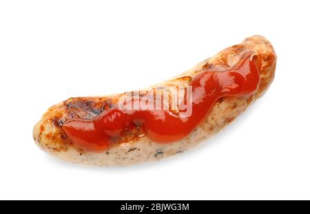 Köstliche gegrillte Wurst mit Sauce auf weißem Hintergrund Stockfoto