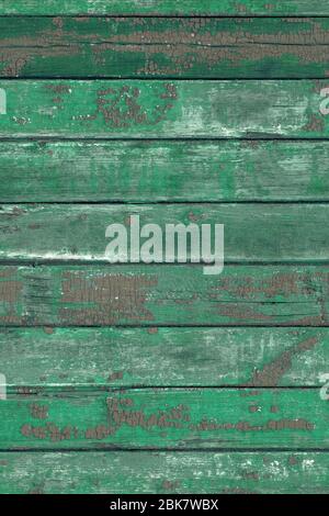 Grüne Holzbretter Draufsicht. Hintergrund aus alten Holz bemalten Brettern Muster für Design. Schöne Holzstruktur für Handy-Bildschirmschoner. Stockfoto
