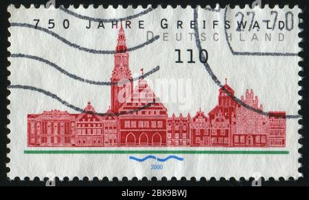 DEUTSCHLAND- UM 2000: Briefmarke gedruckt von Deutschland, zeigt Griefswald, um 2000. Stockfoto