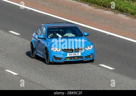 2016 blau BMW M3 S-A; Fahrzeugverkehr bewegende Fahrzeuge, Fahren Fahrzeug auf UK Straßen, Motoren, Autofahren auf der Autobahn M6 Stockfoto