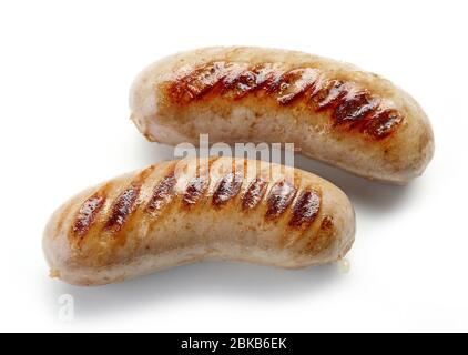 Gegrillte Würstchen auf weißem Hintergrund isoliert Stockfoto