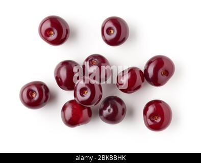 Frische rote Sauerkirschen isoliert auf weißem Hintergrund, Draufsicht Stockfoto