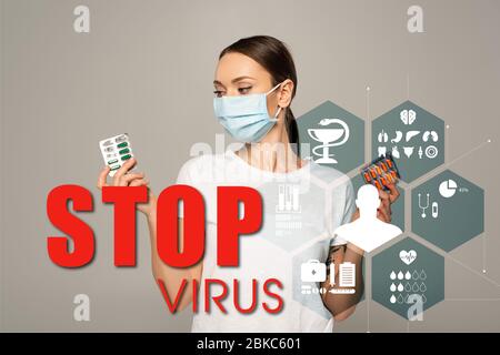 Junge Frau mit Blasen mit Pillen isoliert auf grau, stoppen Virus Beschriftung und medizinische Zeichen Illustration Stockfoto