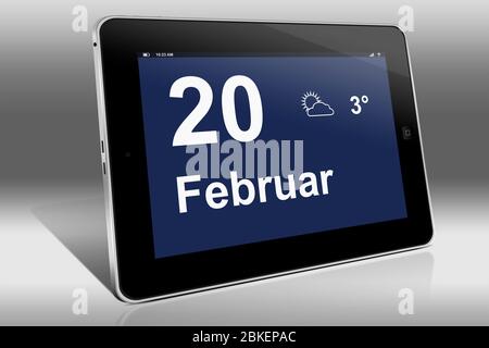 Ein Tablet-Computer zeigt einen Kalender in deutscher Sprache mit dem Datum 20. Februar an. Ein Tablet-Computer zeigt das Datum 20 an. Februar Stockfoto