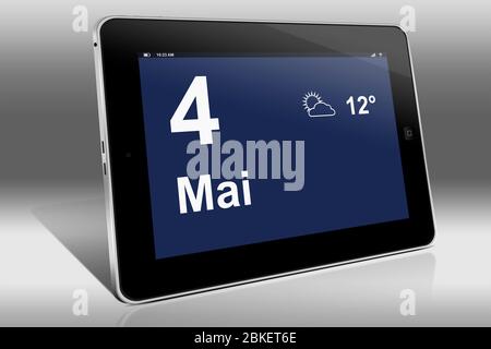 Ein Tablet-Computer zeigt einen Kalender in deutscher Sprache mit dem Datum 4. Mai an. Ein Tablet-Computer zeigt das Datum 4. Mai Stockfoto