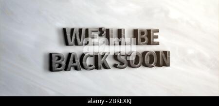 Wir werden bald wieder schwarzen Marmor Schild auf Marmor Wall.Business im Bau concept.3d Rendering Text Stockfoto