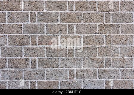 Alt grau Backstein Wand Hintergrund Stockfoto
