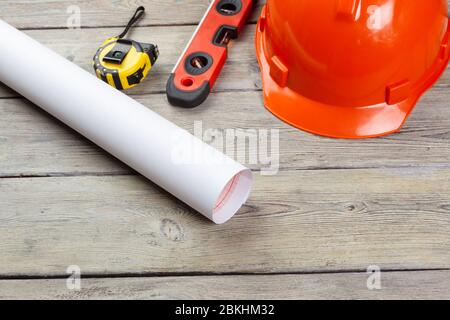 Bauarbeiter liefern und Instrumente auf Holzgrund Stockfoto