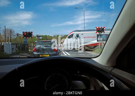 Greater anglia Lowestoft nach London Personenzug auf der East Suffolk Nebenstrecke, Melton, Suffolk, England. Stockfoto