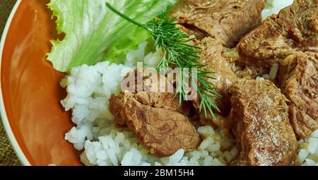 Rindfleisch Tipps auf Reis, zartes Rindfleisch Eintopf gekocht, südlichen Komfort-Essen. Stockfoto