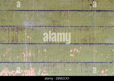 Alte kleine Holzbretter mit abblätternder Farbe Stockfoto