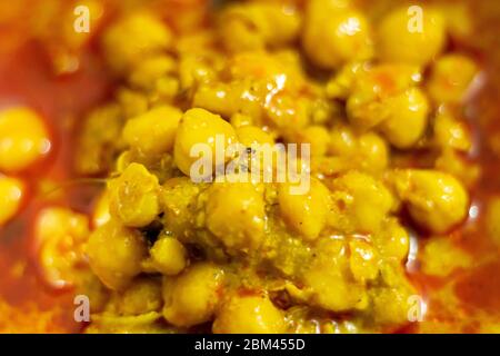 Chole oder Kichererbsencurry, leckeres punjabi chole Curry, selektiver Fokus. Stockfoto