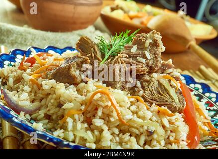 Chorezmskiy usbekischen plov Chalov, authentische Reis und Lamm Gericht für eine Party aus dem Herzen von Mittelasien Stockfoto