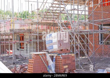 Verlassene, leere, verlassene Hausbau UK Baustelle. Stockfoto