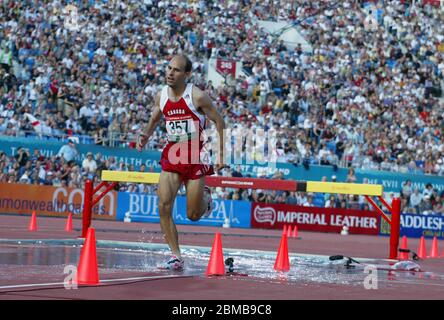 MANCHESTER - JULI 27: Joel BOURGEOIS aus Kanada tritt bei den Commonwealth Games in Manchester 27 Juli 2002 in der Männer 3000 m Steeplechase an. Stockfoto