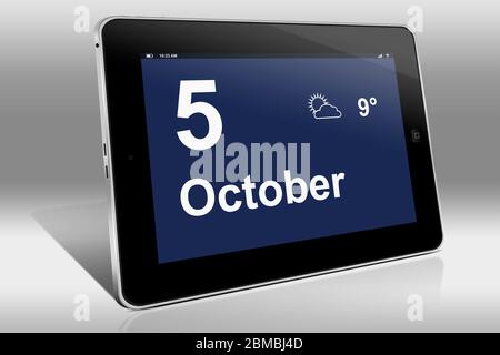 Ein Tablet-Computer zeigt einen Kalender in englischer Sprache mit dem Datum 5. Oktober an. Ein Tablet-Computer zeigt in englischer Sprache den 5. Oktober Stockfoto