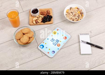 Gesunde Tablet PC-Compositur mit EAT CLEAN Inschrift, Gewichtsverlust Konzept Stockfoto