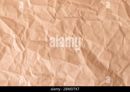 Textur eines zerknittert Papier in hellorange Farbe. Leerer Hintergrund. Stockfoto