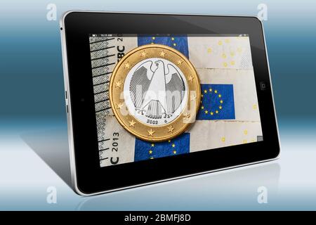 Eine 1-Euro-Münze aus Deutschland auf Euro-Banknoten, Blick auf einem Tablet PC Stockfoto