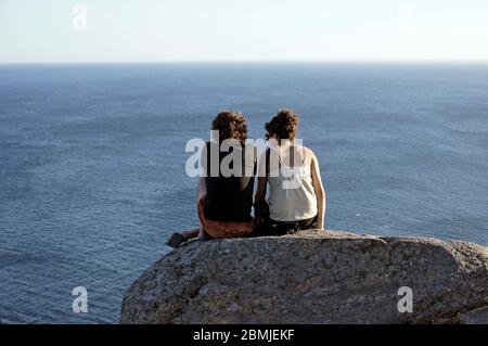Peregrinos en el Cabo de Finisterre (fin del Camino de Santiago). La Coruña. Galicien. España Stockfoto