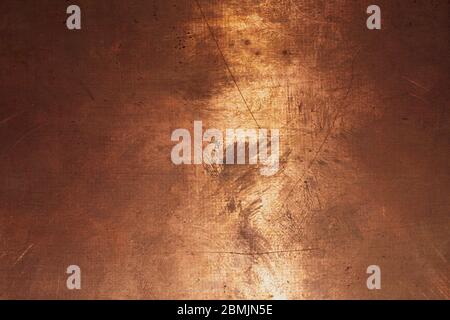 Kupferoberfläche. Bronze Hintergrund. Metallplatte mit Flecken und Kratzern. Braune Grunge Textur Stockfoto