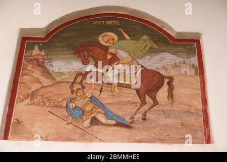 St. Demetrios Tötung der Gladiator Lyäus- Wandbild auf der Außenseite einer orthodoxen Kirche in Rumänien Stockfoto