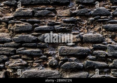 Alte feste Steinmauer. Hintergrund Texturbild. Stockfoto