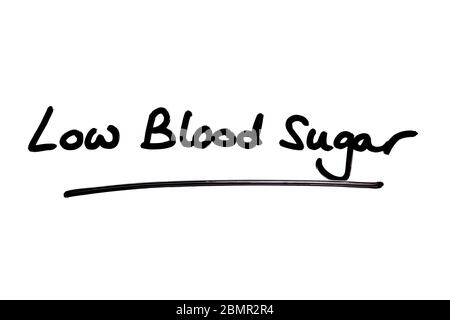 Low Blood Sugar handgeschrieben auf weißem Hintergrund. Stockfoto