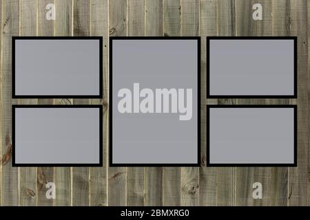 Collage aus leeren Bilderrahmen auf altem Holzhintergrund. Design, Inneneinrichtung, Mock-up Stockfoto