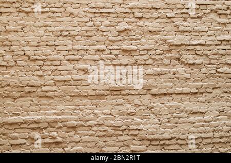 Hintergrund der Ziegelwand Textur gelb beige Stockfoto
