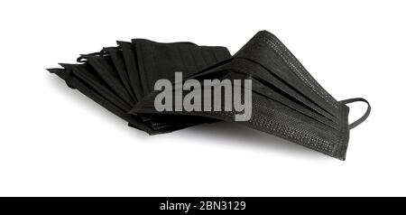 Schwarze Gesichtsmasken auf weißem Hintergrund Stockfoto