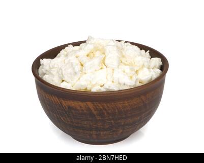 Frischer hausgemachter Quark in einer Schüssel. Körnung Quark. Stockfoto
