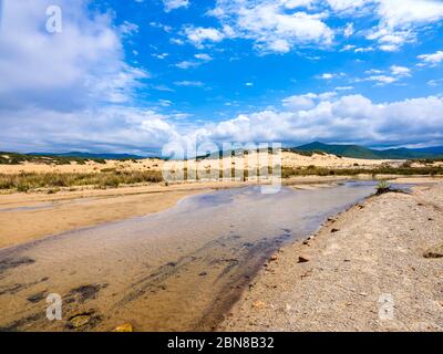 Die wunderbare Oase Piscinas, mit imposanten und gewundenen Dünen von feinem, warmen goldenen Sand, als einer der schönsten in der Welt Stockfoto