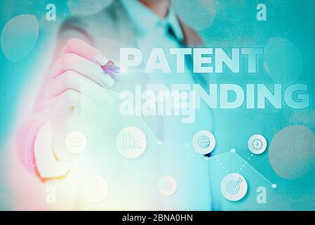 Schreiben Sie einen Hinweis mit dem Hinweis auf das anhängige Patent Geschäftskonzept für Antrag bereits eingereicht, aber noch nicht gewährt Verfolgung Schutz Stockfoto