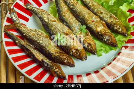 Gegrillte Sardinen, italienisch-amerikanische Fischtradition für Heiligabend Stockfoto