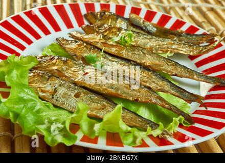 Gegrillte Sardinen, italienisch-amerikanische Fischtradition für Heiligabend Stockfoto