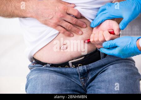 Patient leidet an Diabetes Hausarzt Stockfoto