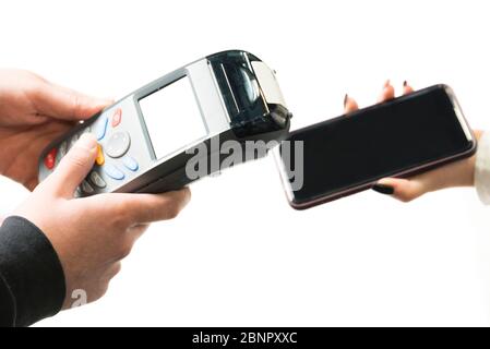 Mobiltelefone und POS-Maschinen im Büro Stockfoto