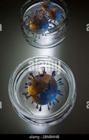 Corona-Viren in Petrischalen vor abstraktem Hintergrund Stockfoto