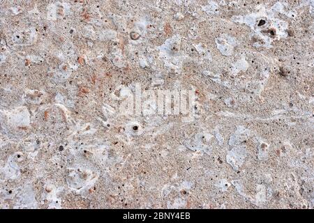 Hintergrund. Alte Betonplatte von einem warmen Schatten Stockfoto