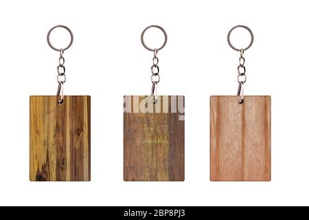 Set Vintage Schlüsselanhänger mit Holzbrett isoliert auf weißem Hintergrund. Platz für Ihr Design Stockfoto