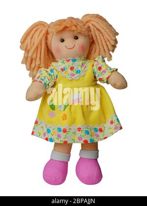 Lächelnd stehend Niedliche Stoffpuppe isoliert auf weiß Stockfoto