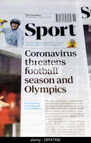 Sport-Abschnitt "Coronavirus bedroht Fußballsaison und Olympiade" Guardian Zeitung Sport-Überschrift inside page 11 März 2020 London England UK Stockfoto