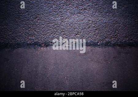 Trennlinie zwischen Straßenbelag Stockfoto