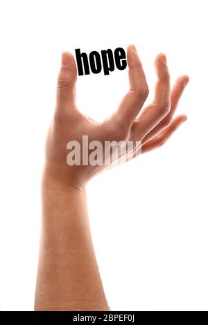 Farbe vertikale Aufnahme einer Hand drückt das Wort "Hoffnung". Stockfoto