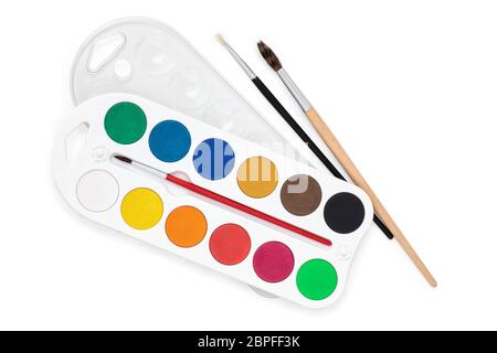 Aquarell Gaumen und Pinseln auf weißem Hintergrund. Stockfoto