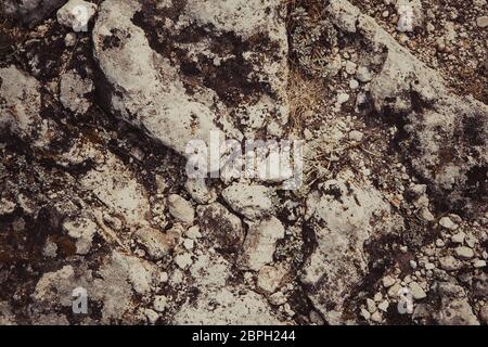 Verbrannt dunklen, detaillierten Stein Textur. Stockfoto